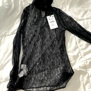 Zara size medium but fits like a small lace top